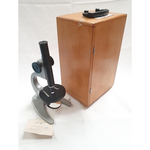 398 - A vintage microscope in wooden case (REF 33).