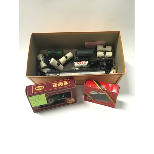 293 - Collection of OO gauge rolling stock to include Hornby Esso petrol tank, Wakefield Castro’s Motor Oi... 