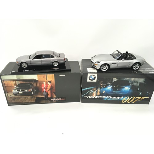 429 - Three Large 1:18 scale, one 1:24 scale and one 1:43 scale diecast model BMW from the James Bond film... 