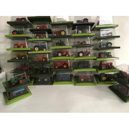 421 - Collection of 35 Hachette Tractors diecast models in bubble packs.