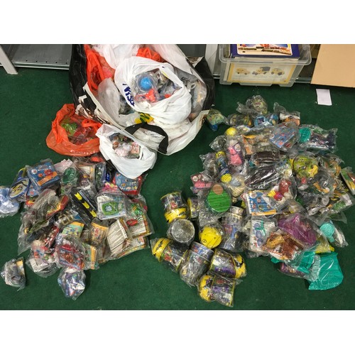 320 - Large collection of various sealed Happy Meal toys. (Approx 250).