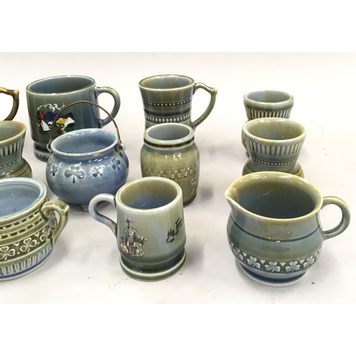 47 - A quantity of Wade miniatures to include mugs, jugs etc.