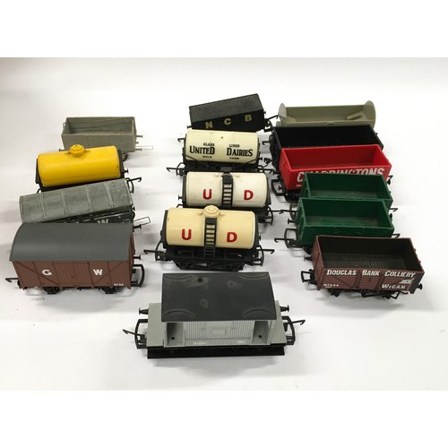 192 - 15 various make unboxed freight wagons. Various conditions.