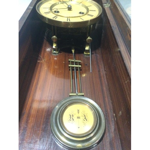 342 - Art nouveau brass faced striking wall clock with pendulum