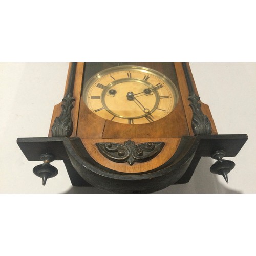 342 - Art nouveau brass faced striking wall clock with pendulum