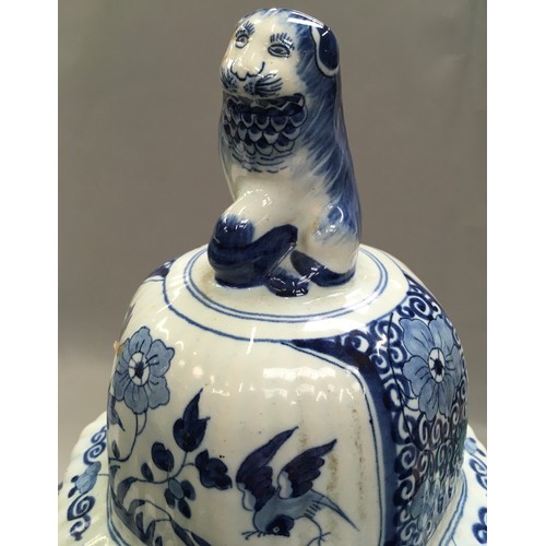 271 - Large blue and white oriental ginger jar with lion finial to the top 53cm tall.