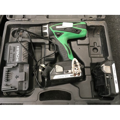 280 - Hitachi combi cordless battery power drill and charger together with a Makita hp457d cordless hammer... 