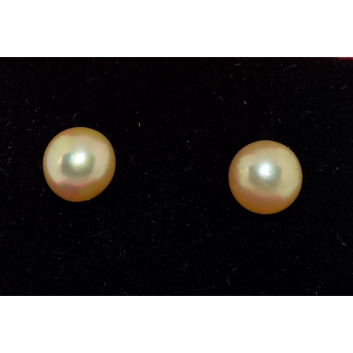 588 - Pair of cultured pearl studs set in silver