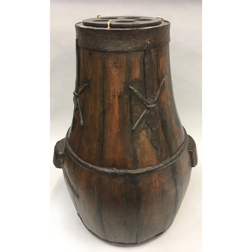 300 - Chinese hard wood brass bound barrel/rice carrier of baluster form with metal strap work decoration ... 