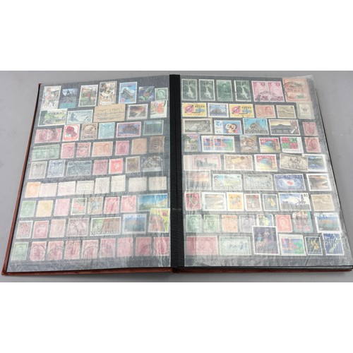 248 - Brown album of New Zealand stamps