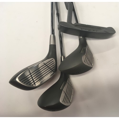 325 - Four golf clubs