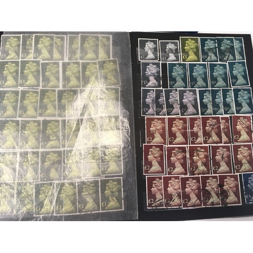 259 - Four albums of assorted GB stamps.