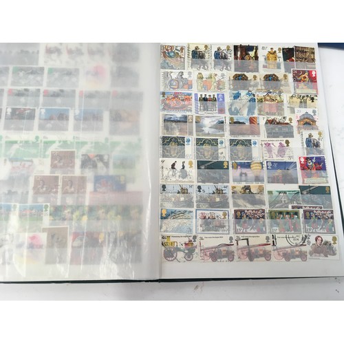 259 - Four albums of assorted GB stamps.