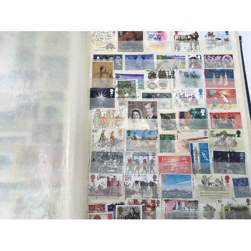 259 - Four albums of assorted GB stamps.