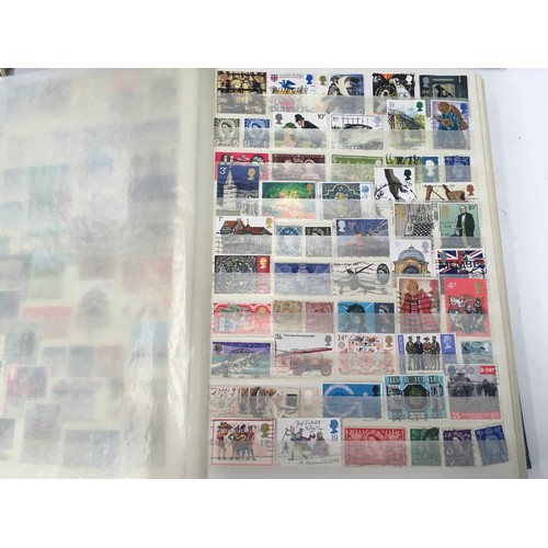 259 - Four albums of assorted GB stamps.