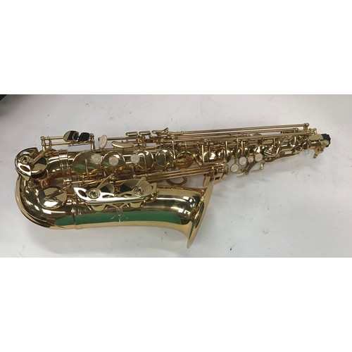 335 - Ammoon child's saxophone with mouthpieces in case.