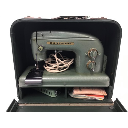 332 - Vintage 1950's Zundapp German electronic sewing machine with instructions and accessories in case.