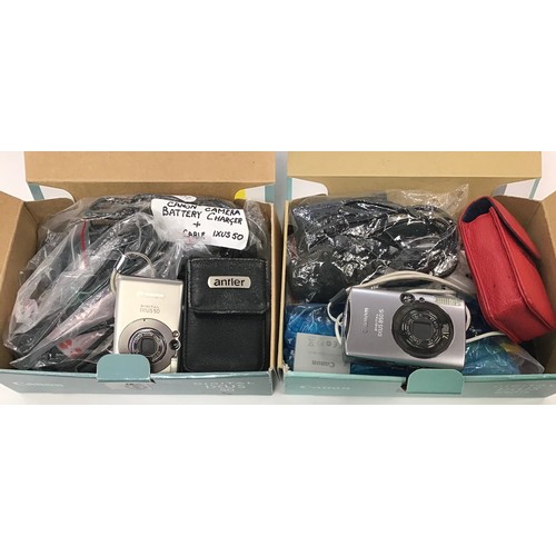 330 - Collection of assorted cameras to include Canon and Olympus.