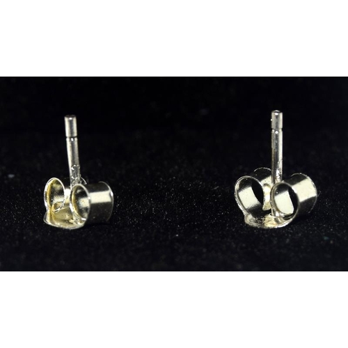 290 - A pair of substantial silver and CZ stud earrings 5cts +