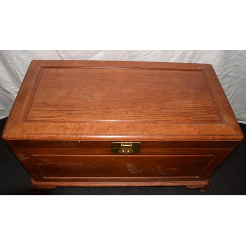 196 - Quality hardwood coffer with inlaid shelf and brass clasp. 104cm across x 53cm deep x 60cm tall.