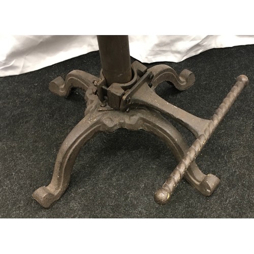 224 - Cast iron adjustable bar stool with wooden seat 60cm tall.