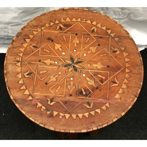 236 - Moorish round topped table with folding base 42cm tall 36cm diameter.