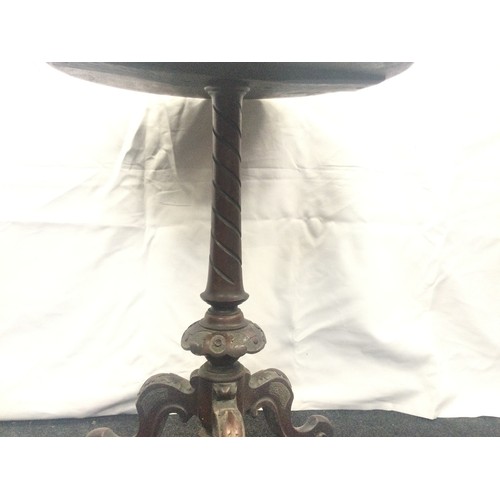 244 - Inlaid mahogany wine table on tripod base 64cm tall 48cm diameter.