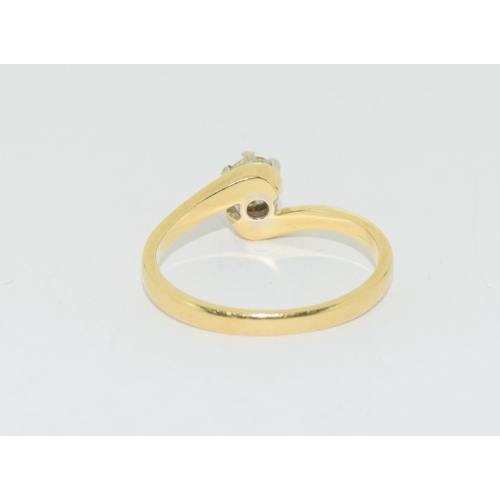 124 - Diamond solitaire 0.33points in 18ct gold twist ring.