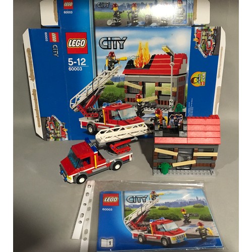 584 - Lego City bundle with boxes and instruction manuals to include 60003 Fire Emergency, 7286  Prisoner ... 