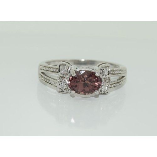 38 - 9ct white gold ladies diamond and amethyst ring size N