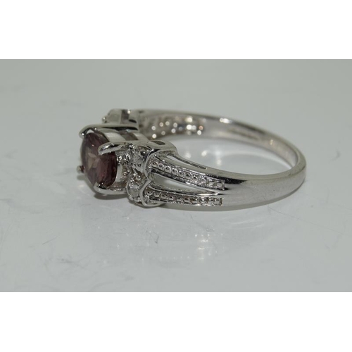 38 - 9ct white gold ladies diamond and amethyst ring size N