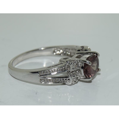 38 - 9ct white gold ladies diamond and amethyst ring size N