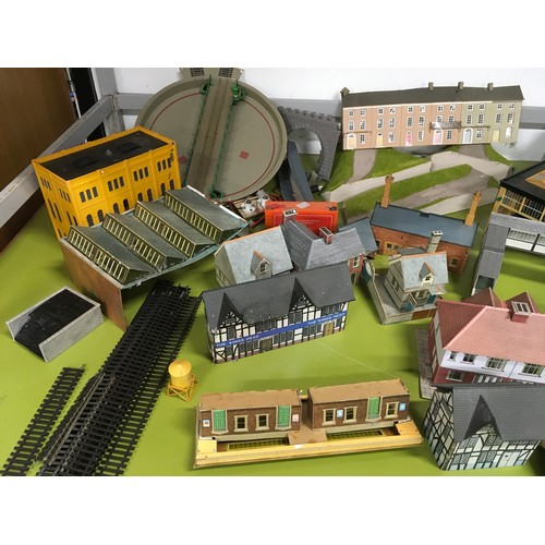 56 - Large collection of model railway buildings.