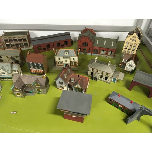 56 - Large collection of model railway buildings.