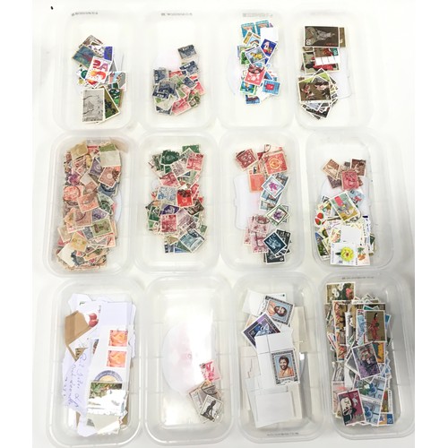 64 - large quantity of world stamps to sort