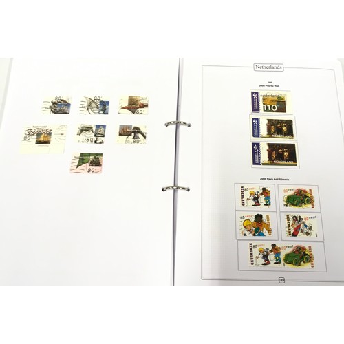 66 - 2 folders containing a good selection of Netherlands stamps
