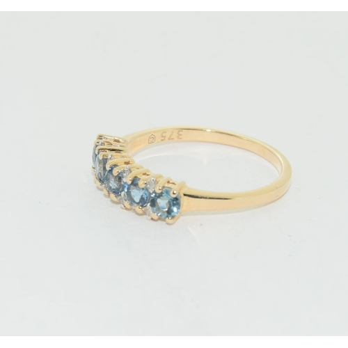 527 - 9ct gold Diamond and Aquamarine 5 stone ring size P