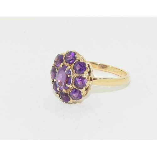 549 - 9ct gold ladies Amethyst cluster ring size L