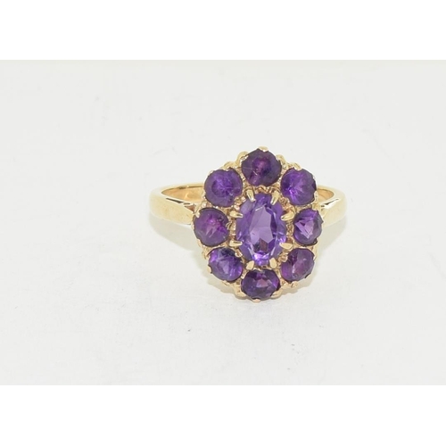 549 - 9ct gold ladies Amethyst cluster ring size L