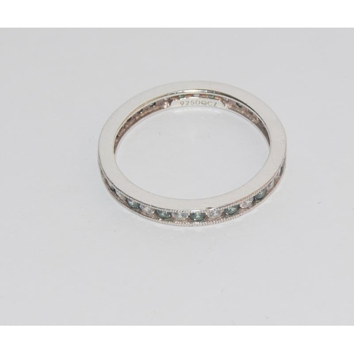 474 - Deco inspired emerald cz 925 silver full band eternity ring. Size T.