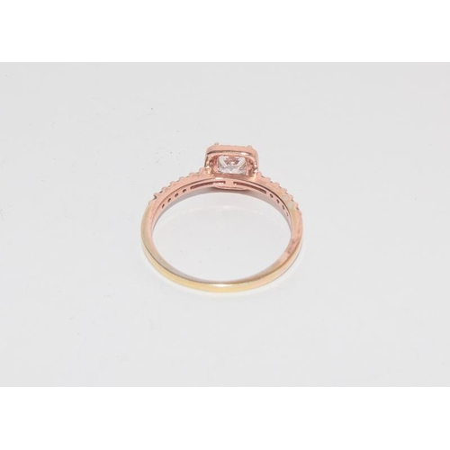 596 - Stylish CZ gold on 925 silver halo ring. Size T 1/2.