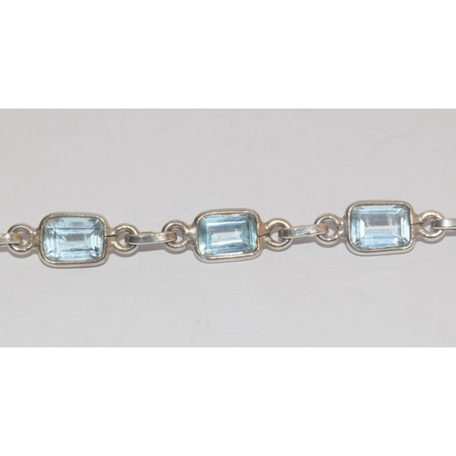 513 - Aquamarine 925 silver riviere beaclet.