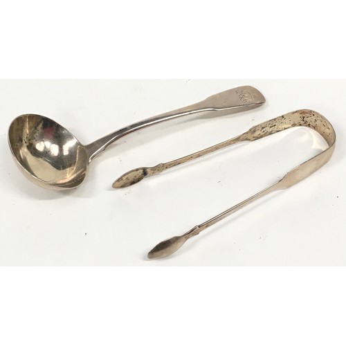 403 - Silver hallmarked sugar togs together with a silver hallmarked ladle and napkin rings.