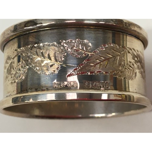 403 - Silver hallmarked sugar togs together with a silver hallmarked ladle and napkin rings.