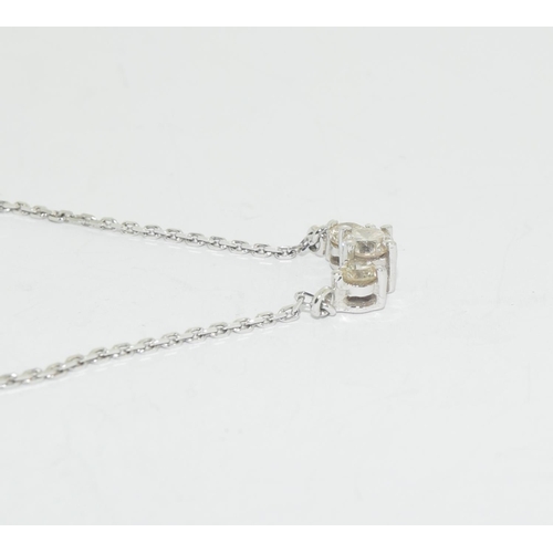 583 - Diamond 3 stone pendant approx 0.70 on 18ct white gold chain.