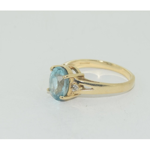 441 - Topaz/Diamond 9ct gold ring Size N +