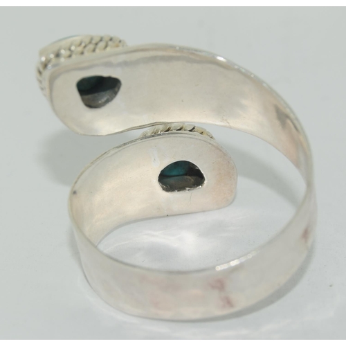 471 - A 925 silver ring with turquoise stones.