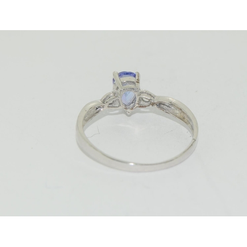 501 - A Tanzanite and CZ 925 silver ring, Size R