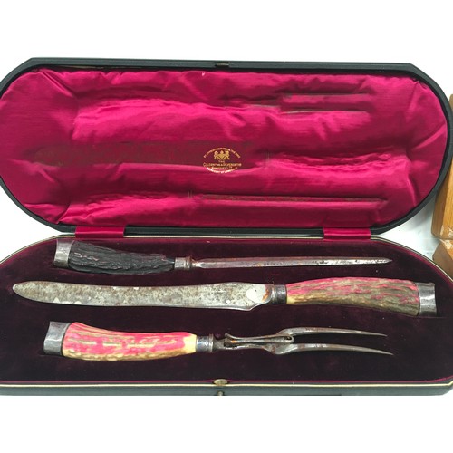 401 - Two sets of carving knives with extras.