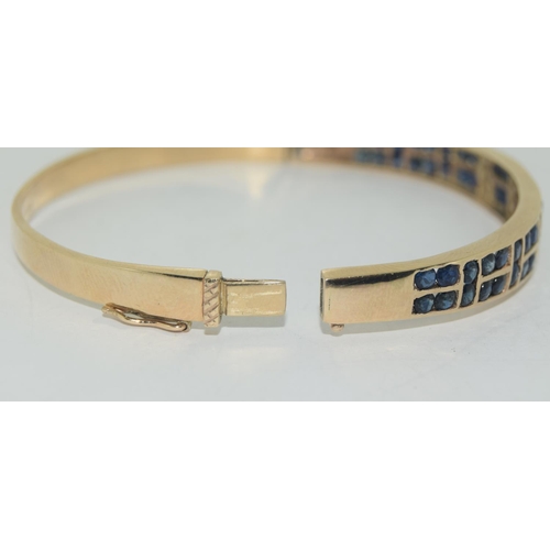 592 - Vintage 9ct gold Sapphire & Diamond bangle.